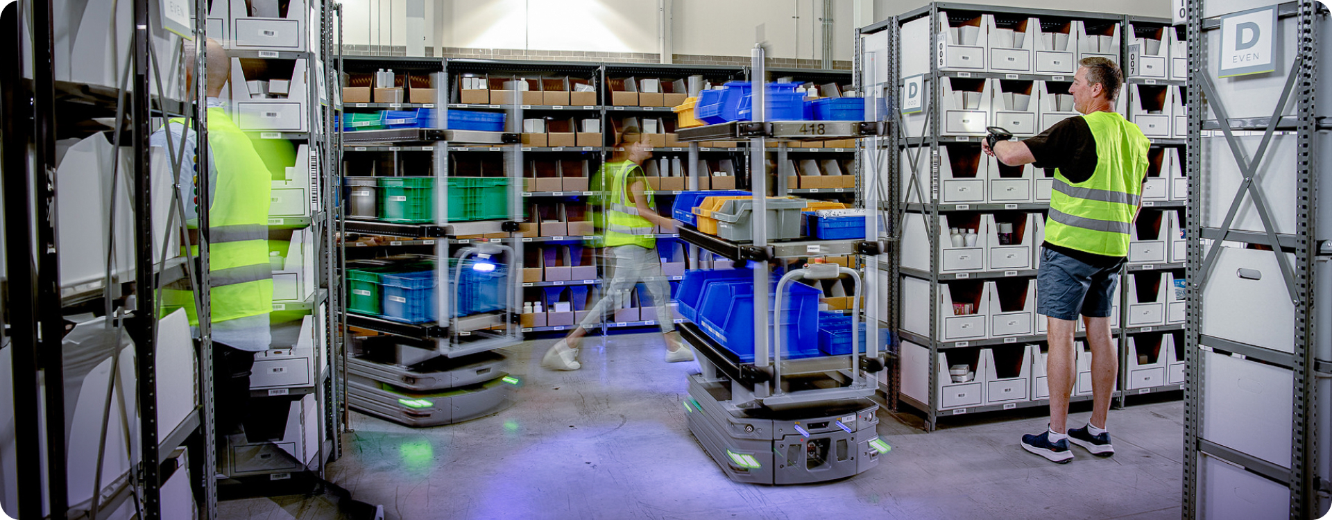 Lumabots and human pickers in a distribution center